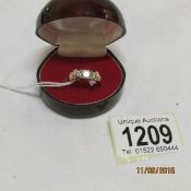 An 18ct gold ring set diamonds