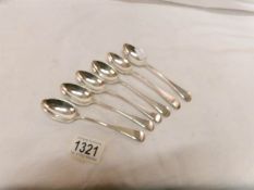 A set of 6 silver monogrammed teaspoons,