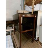 A mahogany drop leaf tea trolley