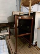 A mahogany drop leaf tea trolley