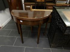 A D shaped mahogany fold over table