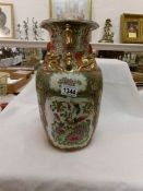 An Oriental hand painted vase (35cm)
