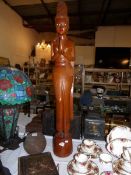 A large carved wood Indian figure