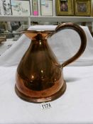 A Victorian copper ale jug