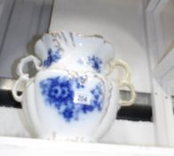 A Victorian blue and white slop bucket,