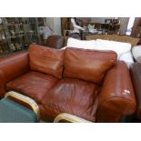 A tan leather sofa