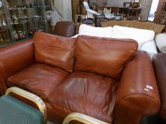 A tan leather sofa