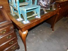 A mahogany writing table