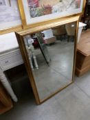 A gilt framed mirror