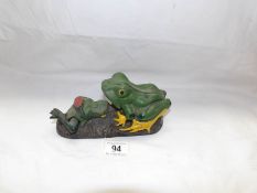 A mechanical frog money bank