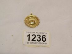A 9ct gold watch fob,