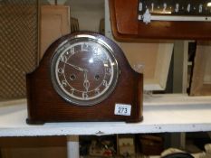 An oak mantel clock