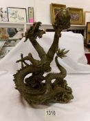 A Chinese bronzed statue of a dragon