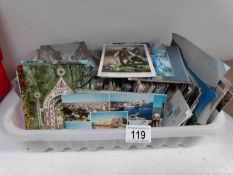 A box of mixed postcards