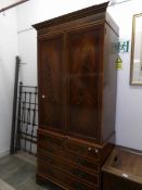 A mahogany inlaid 2 door bookcase on 2 over 3 drawer base