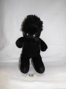 A Merrythought googly eyed black doll