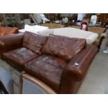 A brown leather sofa