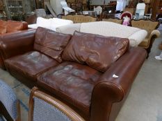 A brown leather sofa