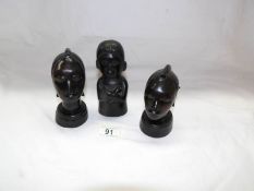 2 tribal heads and an early tribal figure