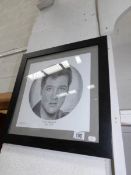 A framed and glazed print of Elvis