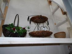 A metal and wicker fruit basket and 2 other items