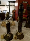 A pair of late 19th century carved wood candlesticks converted to table lamps