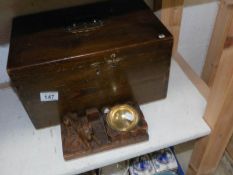 A stained pine box and a carved wood dog ashtray