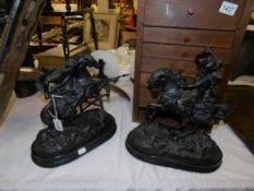 A pair of spelter fighters on horses