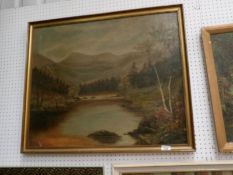 A oil on canvas lake and mountain scene