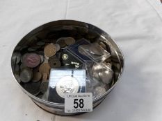 A tin of mixed coins