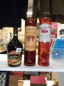 2 bottles of 10 year old malt whisky and a bottle of Baileys