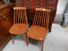 A pair of Ercol style chairs