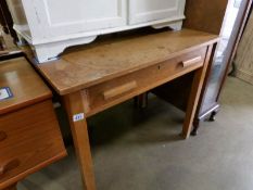 An oak writing table