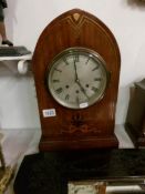 An inlaid Lancet clock with silvered dial and Westminster chime