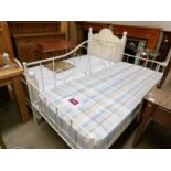 A metal framed 'Laura Ashley' studio bed with mattress