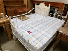 A metal framed 'Laura Ashley' studio bed with mattress