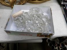 A box of chandelier parts