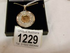 The Diamond Jubilee 60 diamond quarter sovereign pendant on 18" gold plated chain.