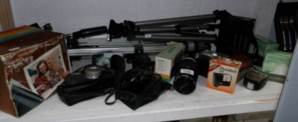 A good collection of camera's, flashes, tripods etc including Metz, Olympus, Canon,