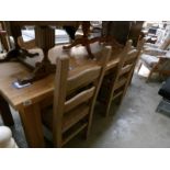 A Pine dining table and 4 chairs