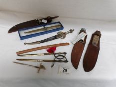 A collection of daggers and knives