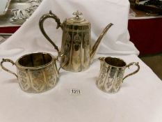 A three piece silver plated tea set