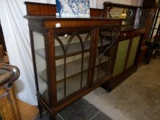 A mahogany display cabinet