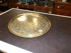 A large brass tray