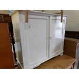 A painted 2 door cupboard