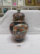 A large lidded Imari vase, 30cm,
