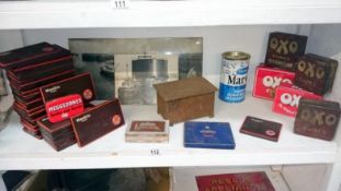 A quantity of advertising tins including OXO