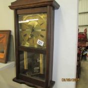 An oak wall clock