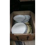 A box of old enamel ware