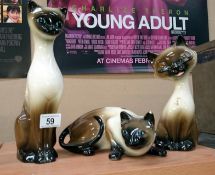 3 porcelain cat figures